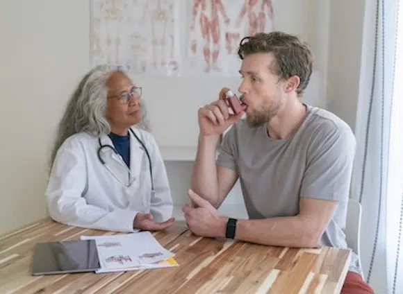 Man with asthma going for a treatment to the doctor