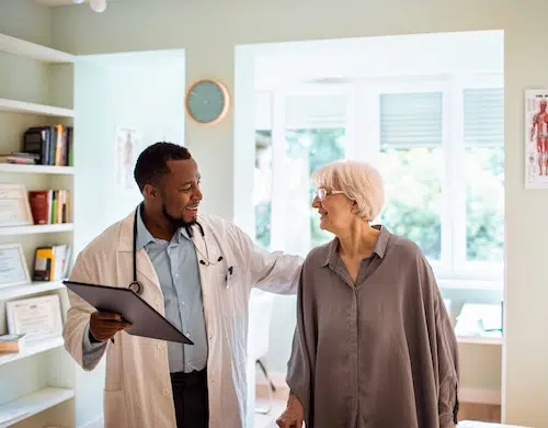 Elderly woman seeing doctor in AllerVie - Immunological disorders