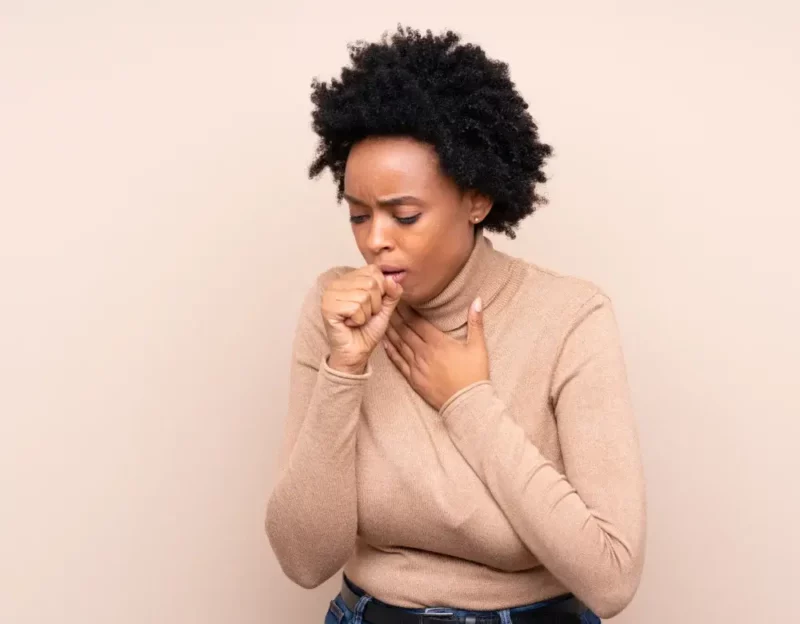 Woman having a cough - Pulmonary Disease - COPD