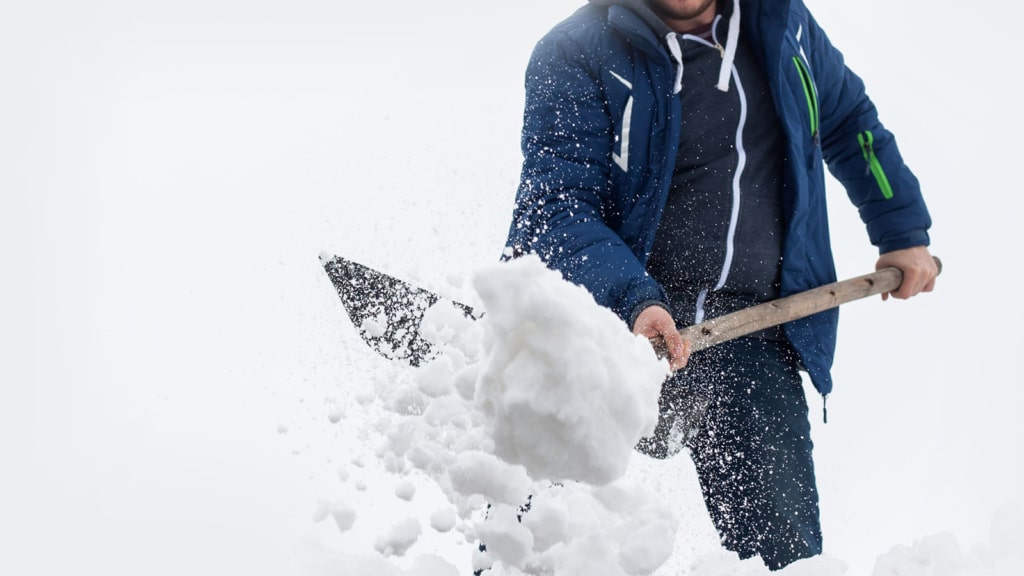 Men shoveling snow